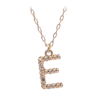 short metal necklace with textured “E” letter pendant