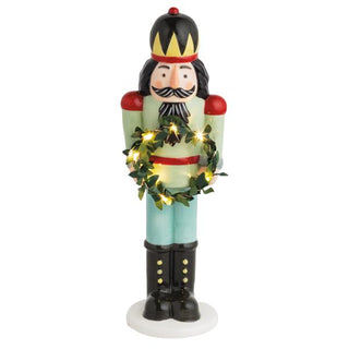 small light-up nutcracker sitter