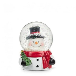 small snowman head in snow globe