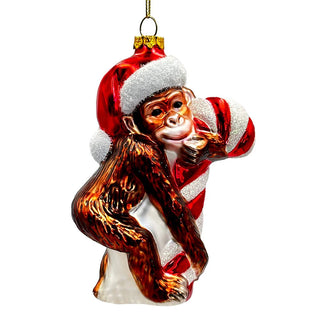 cute monkey with candy cane glass ornament