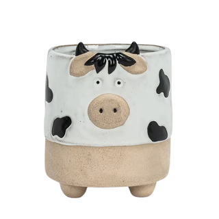large cow on legs planter